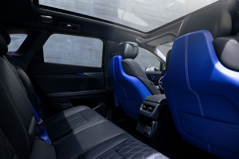 Back Seat View of the 2026 OPTIQ-V Blue Front Seats, Sun Roof, and Interior | Crown Cadillac in Watchung NJ